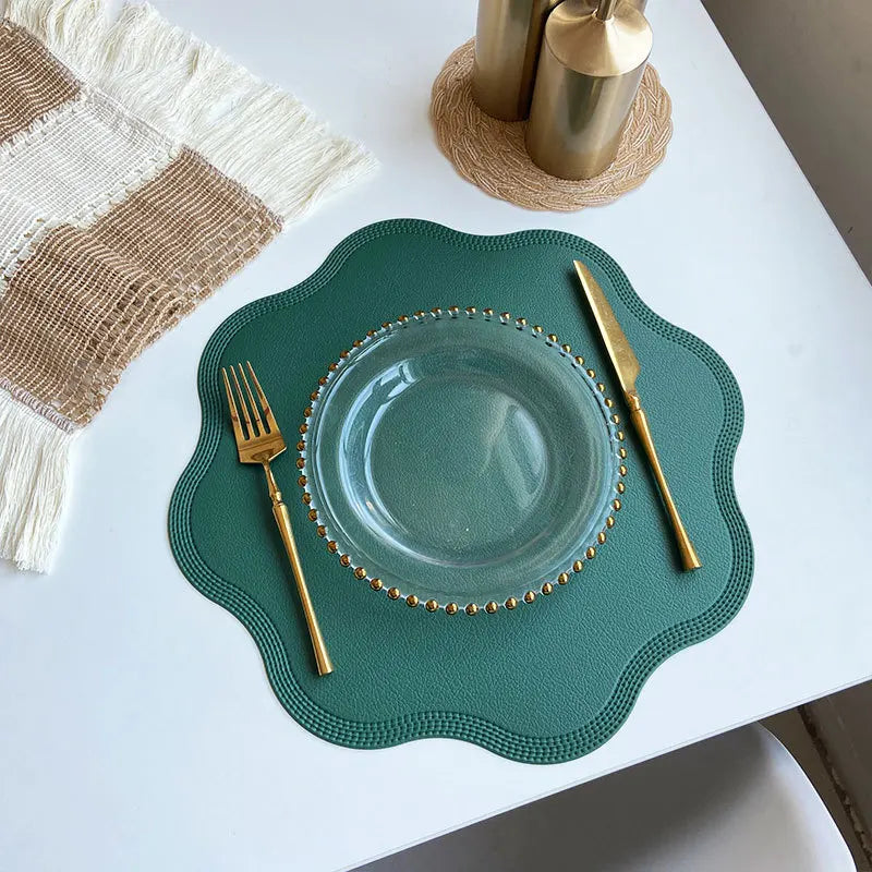 Elegant Noah's Placemat enhancing a dining table with cutlery and a decorative setting.