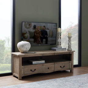 Stone-textured ceramic Shola Vase as a modern centerpiece on a wooden console table.
