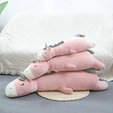 Giant unicorn pillow with ultra-soft materials for kids' comfort and imaginative play.