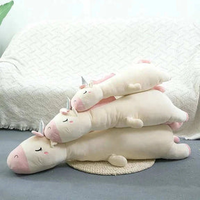 Giant unicorn pillow with ultra-soft materials, ideal for kids' relaxation and room decoration.