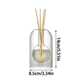 Corelle Diffuser Bottle with reed sticks and double-layer transparent glass design.