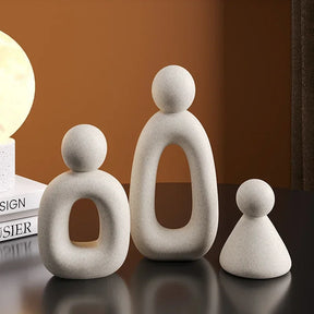 Minimalism Family Statue with neutral color palette and modern design.