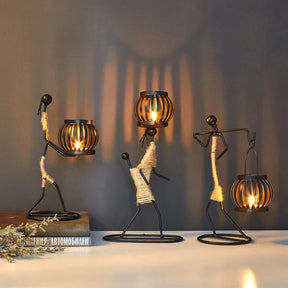 Ewa Candle Holder with African woman design, enhancing home decor ambiance.