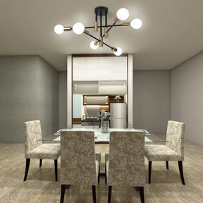 Alexis LED Ceiling Chandelier illuminating a modern dining room.