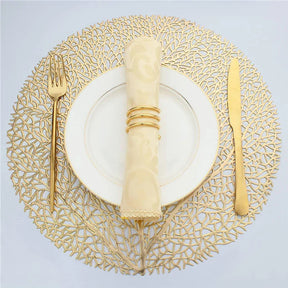 Ollie Placemats set of 4 in golden leaf design, PVC material, perfect for modern table decor.