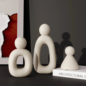 Minimalism Family Statue with neutral tones and modern design.
