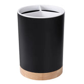 Elegant cutlery drainer with wood and ceramic appearance for kitchen organization.