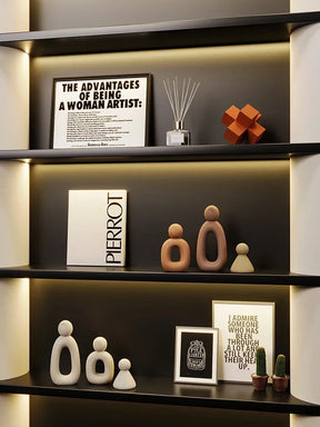 Minimalism Family Statue with neutral palette on display shelf.