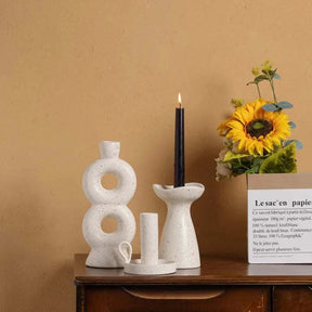 SUKi candle holders in minimalist ceramic design enhancing room decor.